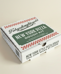 Fuhgeddowahooolit New York Pizza Dough Kit packaging on a dark surface